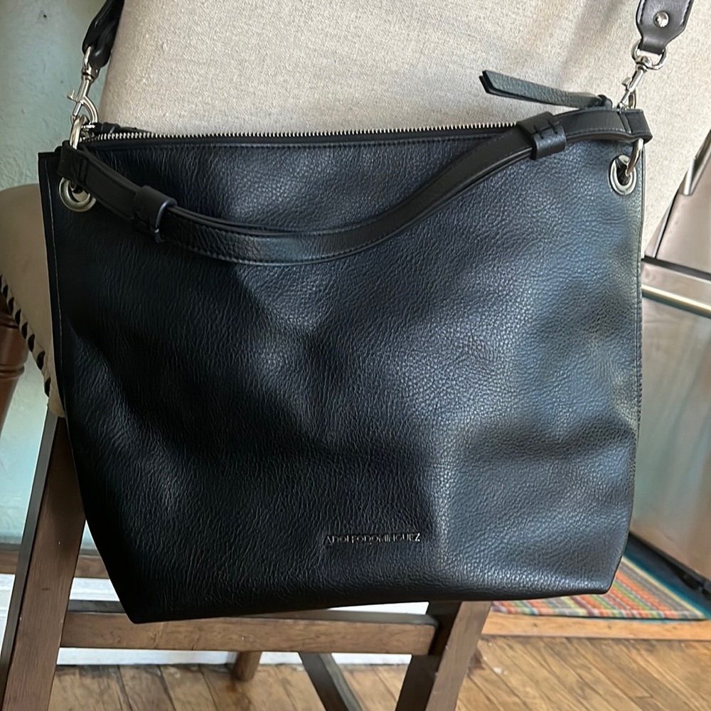 Adolph Dominguez, Black Purse. Silver accents and 2 different straps.